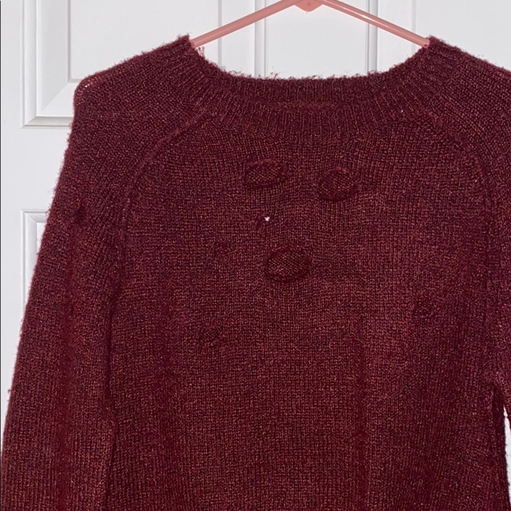 Grungy maroon sweater with holes